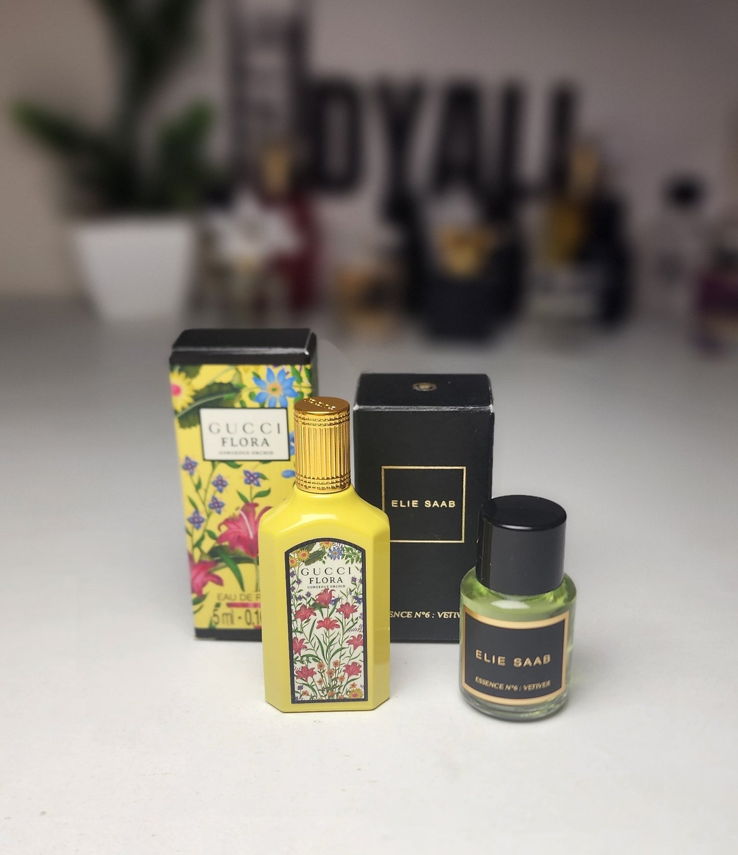 .Pack 2 Miniatures Gucci + Elie Saab